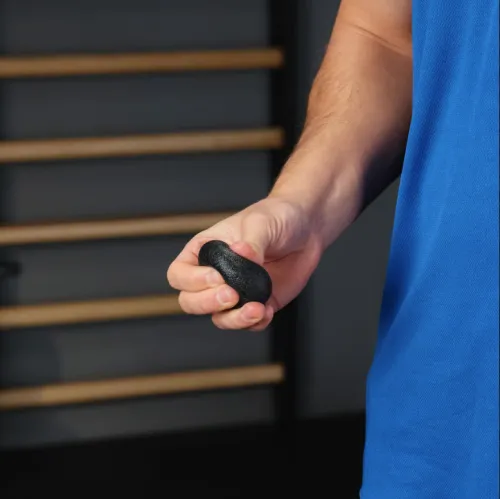 Терапевтичний м'яч для стискання